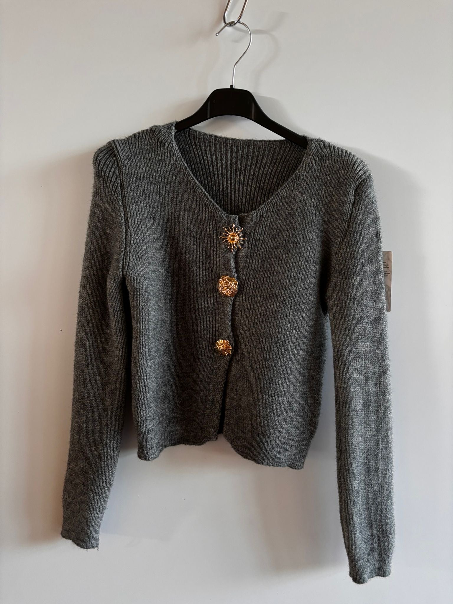 cardigan con dettaglio dorato